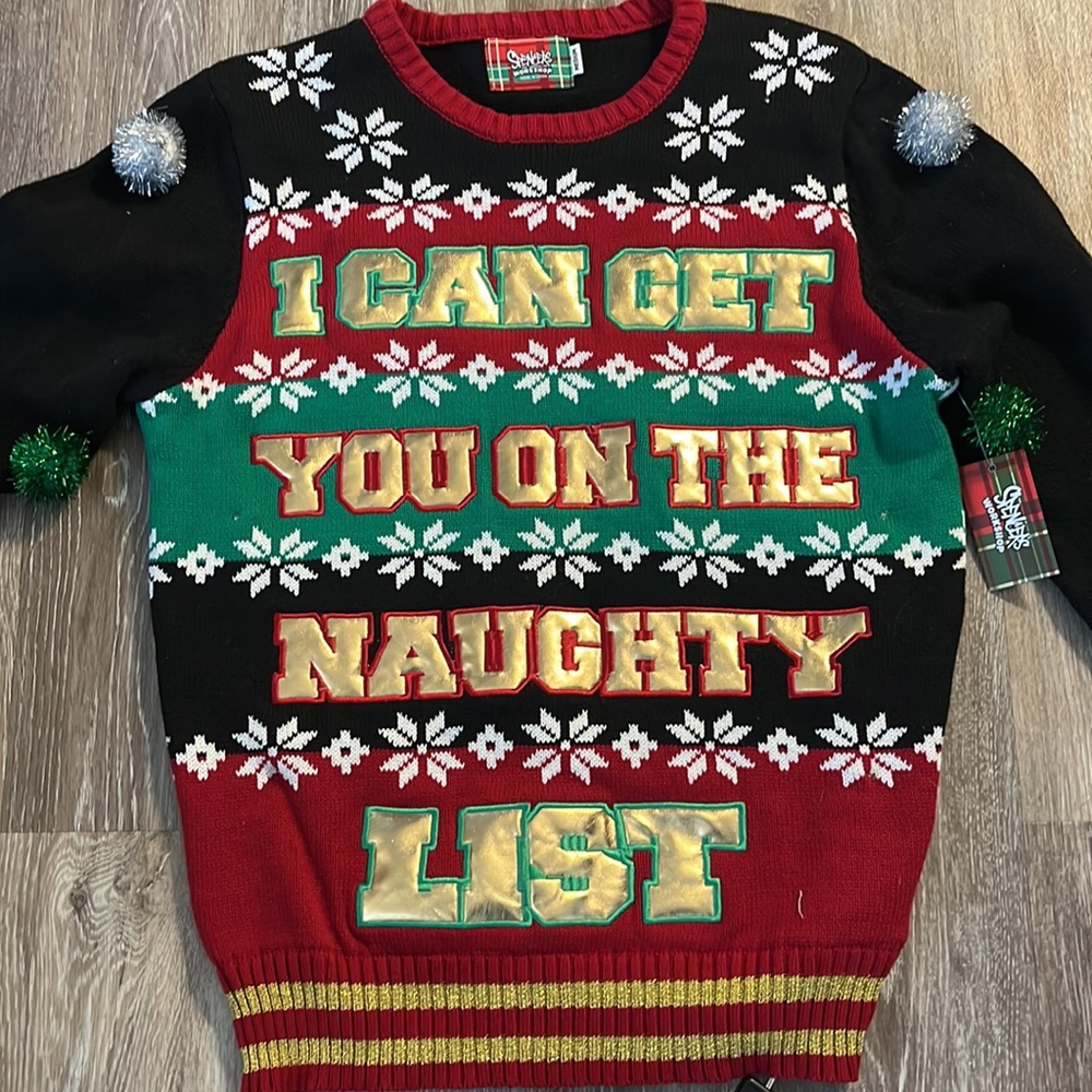 Spencers workshop holiday naughty sweater.